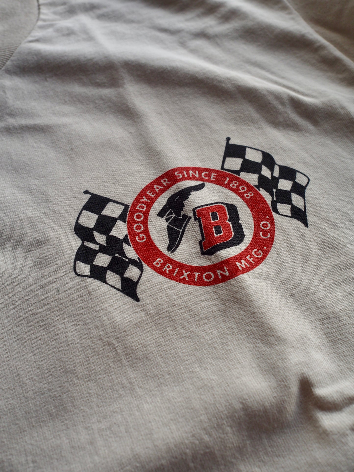 BRIXTON GOODYEAR SPEEDWAY S/S STD -CREAM ブリクストン グッドイヤー スピードウェイ ショートスリーブTシャツ