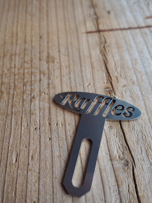 Raffles original license plate topper